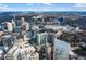Expansive aerial view showcasing the city skyline with a mix of modern skyscrapers and lush green landscapes at 3324 Peachtree Ne Rd # 1813, Atlanta, GA 30305