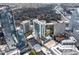 Stunning aerial view of high-rise condominiums with pools and mature trees at 3324 Peachtree Ne Rd # 1813, Atlanta, GA 30305