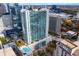 Building and aerial view of an outdoor pool and the city, featuring urban living and city lifestyle at 3324 Peachtree Ne Rd # 1813, Atlanta, GA 30305