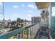 Stunning balcony view overlooking a cityscape with outdoor seating at 3324 Peachtree Ne Rd # 1813, Atlanta, GA 30305