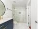 The bathroom has marble tiling and gold accents, including a rainfall shower at 3324 Peachtree Ne Rd # 1813, Atlanta, GA 30305