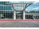 Elegant building entrance with glass doors, brick walkway, and a welcoming feel at 3324 Peachtree Ne Rd # 1813, Atlanta, GA 30305