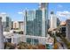 Modern high-rise building with stunning city views and architectural details on a sunny day at 3324 Peachtree Ne Rd # 1813, Atlanta, GA 30305