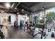 Well-equipped gym with weights, machines, and natural light for a complete workout experience at 3324 Peachtree Ne Rd # 1813, Atlanta, GA 30305