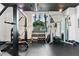 Gym boasts full set of free weights, weight machines and a window for natural light at 3324 Peachtree Ne Rd # 1813, Atlanta, GA 30305