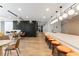 Open concept kitchen features a bar with stool seating and adjacent dining space at 3324 Peachtree Ne Rd # 1813, Atlanta, GA 30305
