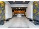 Contemporary lobby area with stylish seating, modern decor, and sleek reception desk at 3324 Peachtree Ne Rd # 1813, Atlanta, GA 30305