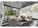 Contemporary lobby with comfortable seating, greenery, and modern artwork at 3324 Peachtree Ne Rd # 1813, Atlanta, GA 30305