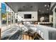 Stylish lobby with a large sectional sofa, fireplace, and floor-to-ceiling windows at 3324 Peachtree Ne Rd # 1813, Atlanta, GA 30305