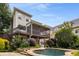 Exterior view of home with stone pool and well-maintained lawn and landscaping at 851 Courtenay Ne Dr, Atlanta, GA 30306