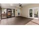 Spacious screened-in porch featuring hardwood floors and access to the home's interior at 851 Courtenay Ne Dr, Atlanta, GA 30306