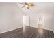Bedroom with wood-look floors, a window, and neutral paint at 1576 Thornwick Trce, Stockbridge, GA 30281