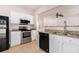 Modern kitchen featuring granite countertops and stainless steel appliances at 1576 Thornwick Trce, Stockbridge, GA 30281