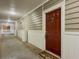 Hallway leads to unit door with painted walls and trim at 2700 Pine Tree Ne Rd # 1013, Atlanta, GA 30324