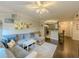 Living room showcasing an open-concept layout with dark floors, and lots of comfortable seating at 2700 Pine Tree Ne Rd # 1013, Atlanta, GA 30324