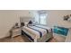 Comfortable bedroom with a large bed, nightstands, and bright natural light at 446 Vandenburg Dr, Villa Rica, GA 30180