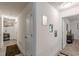 Bright hallway with doors leading to different rooms and vinyl plank flooring at 446 Vandenburg Dr, Villa Rica, GA 30180