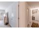 Hallway with doors leading to different rooms, and carpeted flooring at 446 Vandenburg Dr, Villa Rica, GA 30180