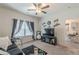 Relaxing living room with a large window, a flat screen TV, and nice decor at 446 Vandenburg Dr, Villa Rica, GA 30180