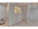 Hallway in basement with access to additional rooms and stairway at 5507 Martina Way, Dunwoody, GA 30338