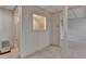 Basement area with a small window, door, and a storage heater at 5507 Martina Way, Dunwoody, GA 30338