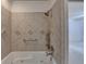 Bathroom features walk-in tub with detachable shower head and decorative tile backsplash at 5507 Martina Way, Dunwoody, GA 30338
