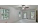 Serene bedroom offering abundant natural light through multiple windows at 5507 Martina Way, Dunwoody, GA 30338