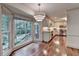 Breakfast nook features hardwood floors, recessed lighting, and a view of the surrounding greenery at 5507 Martina Way, Dunwoody, GA 30338