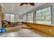 Sunroom with lots of natural light, offering scenic views of the outdoors at 5507 Martina Way, Dunwoody, GA 30338