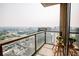 City views from the private balcony, perfect for relaxing or entertaining, with Piedmont sign in the distance at 270 17Th Nw St # 3804, Atlanta, GA 30363