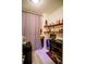 Bar area with unique shelving, a mini fridge and a custom curtain at 270 17Th Nw St # 3804, Atlanta, GA 30363
