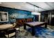 Game room with pool table, card table, and modern geometric wallpaper at 270 17Th Nw St # 3804, Atlanta, GA 30363