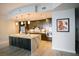 Open kitchen with island, modern appliances, pendant lighting, and light wood floors at 270 17Th Nw St # 3804, Atlanta, GA 30363