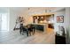 Living room featuring an open concept leading to the kitchen with hardwood floors at 270 17Th Nw St # 3804, Atlanta, GA 30363