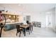 Open-concept living area featuring a modern kitchen, dining space, and sleek finishes throughout at 270 17Th Nw St # 3804, Atlanta, GA 30363