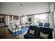 Spacious living room with luxury seating, large windows and built-in shelving at 270 17Th Nw St # 3804, Atlanta, GA 30363