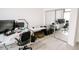 Bright home office area featuring hardwood floors, lots of desk space, and a mirrored closet at 270 17Th Nw St # 3804, Atlanta, GA 30363