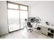 Bright office space featuring large windows with city views, hardwood floors, and two desks at 270 17Th Nw St # 3804, Atlanta, GA 30363