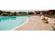 Resort-style pool with blue tile, elegant stone patio, landscaping, and plenty of space to relax at 270 17Th Nw St # 3804, Atlanta, GA 30363
