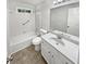 Bright bathroom featuring a shower-tub combination and white vanity at 2734 Amber Springs Way, Buford, GA 30519