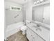 Bright bathroom featuring a shower-tub combination and white vanity at 2734 Amber Springs Way, Buford, GA 30519
