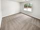 This bedroom has carpet flooring and a window view at 2734 Amber Springs Way, Buford, GA 30519