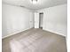 Clean, minimalist bedroom featuring neutral walls and carpet, awaiting personalization at 2734 Amber Springs Way, Buford, GA 30519