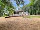 Charming home with beautiful windows, surrounded by a well-maintained lawn at 2734 Amber Springs Way, Buford, GA 30519
