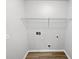 Utility room offers laminate flooring and white wire shelving at 2734 Amber Springs Way, Buford, GA 30519