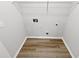 Utility room offers laminate flooring and white wire shelving at 2734 Amber Springs Way, Buford, GA 30519