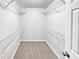 Walk-in closet with shelving for optimal storage at 2734 Amber Springs Way, Buford, GA 30519