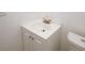 Compact bathroom featuring a corner vanity with a white countertop and a sink at 365 Hunt Creek Dr, Acworth, GA 30101