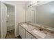 Bathroom featuring double sinks, granite countertops, and a tub-shower combo at 365 Hunt Creek Dr, Acworth, GA 30101