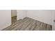 A room with neutral walls and beautiful gray-toned wood flooring at 365 Hunt Creek Dr, Acworth, GA 30101